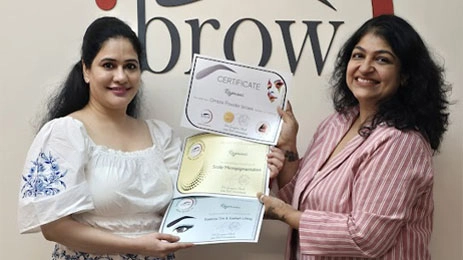 Dr. Gunjan Shah celebrates students' success with Permanent Makeup course certificate