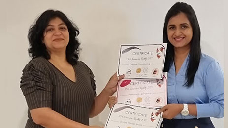 Dr. Gunjan Shah Distributing the Certificates to Her Student